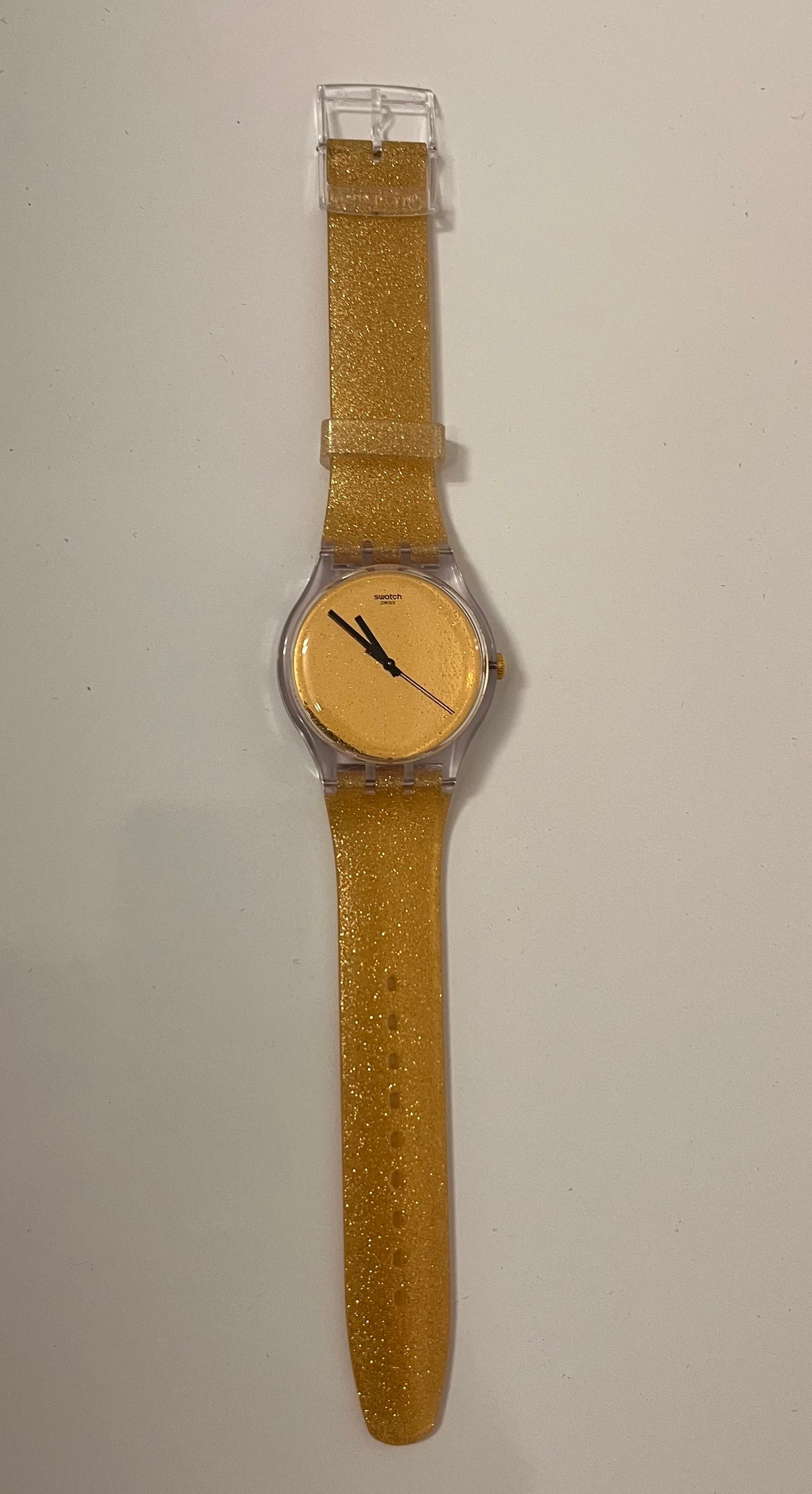 Montre doré Swatch