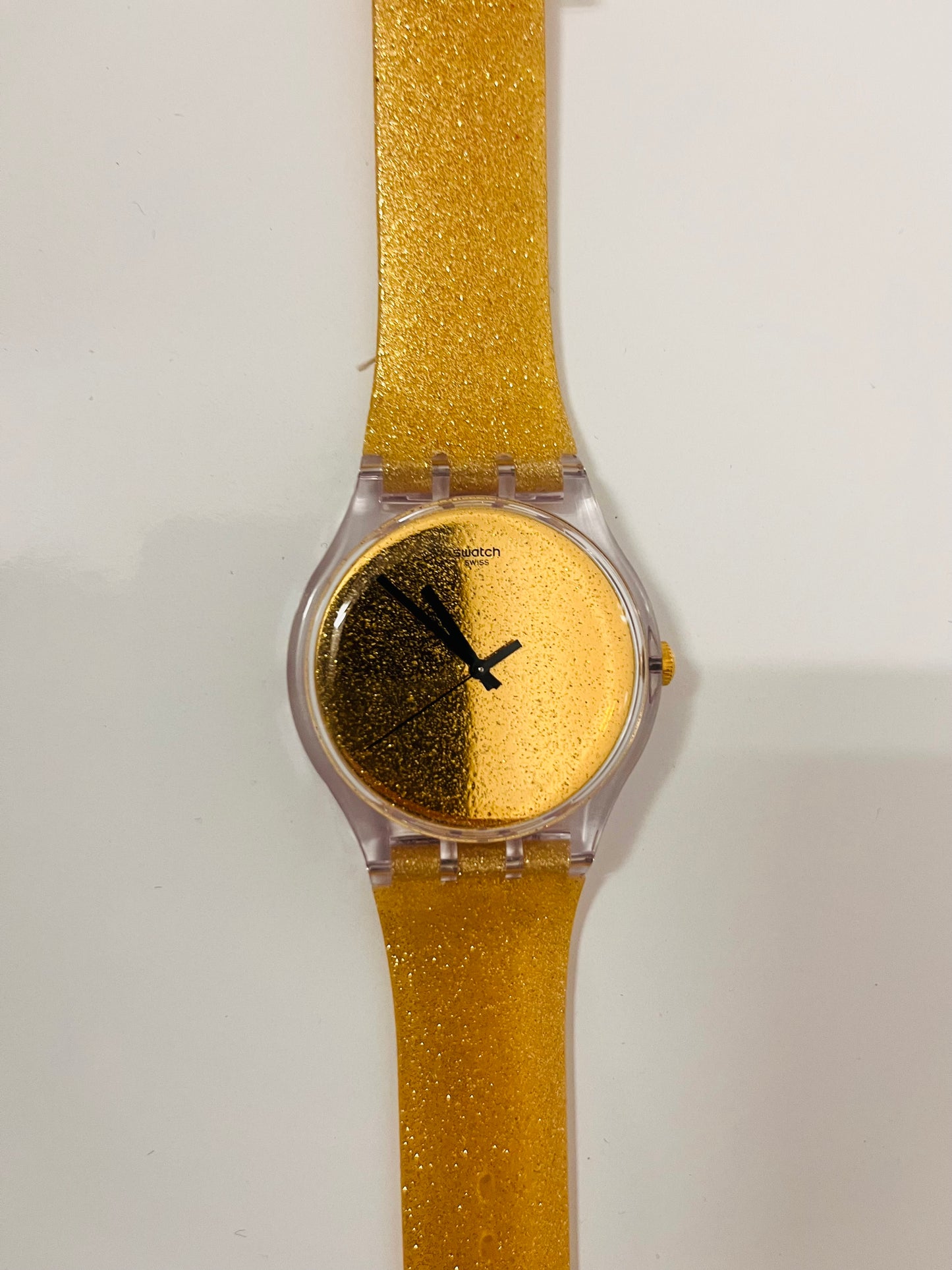 Montre doré Swatch